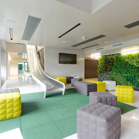Awesome indoor slide:modern office space